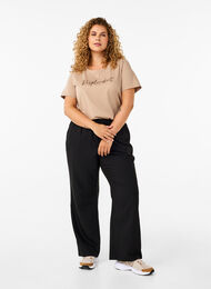 Flared broek met elastiek in de taille, Black, Model