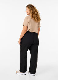 Flared broek met elastiek in de taille, Black, Model